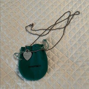 Tiffany & Co. Silver Heart Pendant Necklace with Teal Pouch